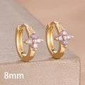 Macro detail of 8mm gold clover hoop earrings with purple cubic zirconia stones - 8mm-Gold Purple-1 Pair