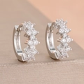 Detailed macro view of silver hoop earrings with two rows of sparkling cubic zirconia stones - Silver White Style (Y26823)