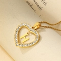 Goldene Herz-Halskette mit funkelnden Zirkonia und beweglichem Buchstaben H - Buchstabe H / Gold