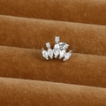 Macro detail of silver crown ear stud with sparkling cubic zirconia on brown velvet - Crown Style (Y20411-14)