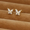 Exquisite golden butterfly stud earrings with sparkling zircons on a velvet jewelry box - Small Gold