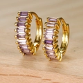 Gold hoop earrings with purple baguette zircons shown on a natural wood background - Gold Purple Zircon Baguette Hoop Earrings (Y20285) / Gold