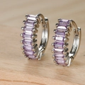Close-up of silver hoop earrings with baguette-cut light purple crystals on wood background - Silver Purple Zircon Baguette Hoop Earrings (Y20285) / Silver