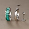 Detail of 3-piece silver earring set featuring an emerald green zircon hoop and studs - Silver Tone with Green Rhinestone