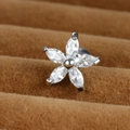 Macro view of flower stud earring with marquise-cut zircons and steel screw back - 0.8mm / Silver