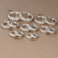 Macro detail of S925 silver hoop earrings with zircon pavé in sizes 5mm to 12mm - Silver With White Zirconia / 10mm