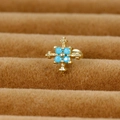 Cross stainless steel stud earring with blue stones on a luxury brown velvet display - Gold (Y20474-5)