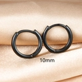 Macro detail of 10mm black minimalist hoop earrings on premium champagne silk fabric - Large / Black