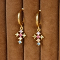 Macro shot of 18K gold plated cross earrings set with colorful zircon on brown velvet - Colorful Rhinestone Cross Pendant Style / Gold (E1165)