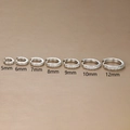 Micro-paved cubic zirconia hoop earrings displayed in sizes from 5mm to 12mm - 10mm / Silver White Zirconia (E1014A)