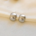 Detail of matte brushed silver bean earrings on creamy silk fabric with macro texture - Brushed Silver (EH10614)