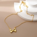 Elegante 18K vergulde strik ketting met farfalle hanger en verstelbare O-ketting - 18K goud