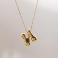 Collier avec pendentif lettre H style ballon doré à l'or 18 carats pour femme - Lettre N (N)