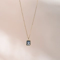 18k gold plated necklace featuring an emerald-cut blue December birthstone pendant - Light Blue (December)