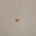 Minimalist 18k gold plated necklace featuring a rectangular pink birthstone pendant - Color-Changing Blue (June)