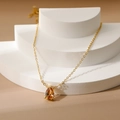 18k gold cross chain necklace with a pear-shaped amber zircon December birthstone - November Citrine Topaz
