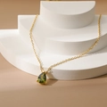 18k gold plated necklace with a pear shaped green zircon drop pendant and cross chain - August Peridot Green