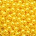 Macro detail of bright yellow acrylic round beads with glossy pearl finish for DIY jewelry - 4mm 500g/Pack Approx 15000 Pcs / Yellow