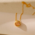 Golden Scorpio zodiac necklace with round pendant and faceted pink gemstone stone - Scorpio