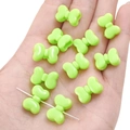 Perline di acrilico verde chiaro a forma di fiocco per gioielli e collane fai-da-te - Verde
