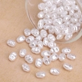 Irregular white Baroque ABS pearl beads with soft luster for DIY jewelry making - Horizontal Rice Style (#26)