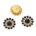 Golden flower-shaped buttons with black and white rhinestones on white background - Black