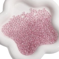 Faceted pink glass beads 4mm for DIY jewelry making displayed on a white petal tray - 4mm (10g/Pack) / Pink