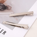 Pair of glossy silver metal duckbill hair clips for DIY hair accessories on a white magazine - Extra Large Style (FHR093-65) / 6.5cm (10 Pieces/Pack) / Silver
