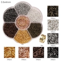 7-grid box of 0.6x4mm metal jump rings for jewelry making in various metallic finishes - Small Jump Rings And Ring Opener Box Set