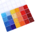 24-grid DIY seed bead set with 2mm glass beads in gradient blue, yellow, and red colors - Red Yellow Blue Mix