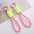 Neon green and pink woven rope keychain set with metallic pink spring clips for bags - Pink