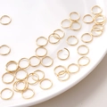 Goldene Edelstahl Binderinge offen für DIY Schmuckherstellung und Perlenverbindungen - 1.0x10mm (10 Stück/Packung)