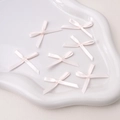 Packung hellrosa Satin-Schleifen für handgefertigte Haarspangen und DIY-Accessoires - Hautrosa