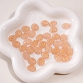 Pink resin beads with gold flower patterns for DIY handmade jewelry and accessory kits - Floral Round Disc Bead (11x14mm)