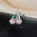 Macro shot of silver cherry stud earring with pink cat-eye stones and green leaf gem - Pink Round Stone Cherry Style (60075-1 Silver)