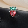 Macro shot of strawberry-shaped stud with heart-cut red stone and marquise green gems - Strawberry Style (60075-3 Silver)