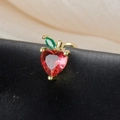 Macro shot of red heart-shaped crystal apple earring with gold setting and green leaf - Red Heart Apple Style (60075-7 Gold Color)