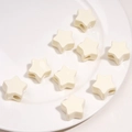 Nine cream white acrylic star beads with smooth glaze finish for DIY jewelry crafting - Pentagram / 1 Piece/Pack (22x14mm, Hole Approx 6.5mm) / Off-white