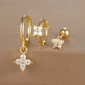 Macro view of S925 engraved gold floral earrings with zircon stones and polished finish - Floral Style Set / Gold (Y26002-1)