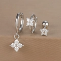 Detailed macro view of silver floral earrings set with micro-inlaid zircon crystals - Floral Style Set / Silver (Y26002-1)