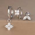 Macro detail of silver clover jewelry set featuring hoop earrings with clear zircons - Flower Ear Bone Stud Style (Y26003-7) / Silver