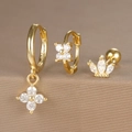 Macro detail of three-piece gold-plated S925 silver earrings set with zircon stones - Crown Flower Style (Y26003-8) / Gold