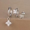 Detailed macro shot of silver flower earrings set with micro-inlaid zircons and clovers - Silver (Y26002-6)