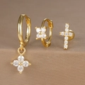 Close-up of gold plated 925 silver earring set with zircons and floral cross charms - Flower Cross Style (Y26003-10) / Gold