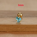 Macro detail of 3mm sky blue heart zircon earring with gold stainless steel screw ball back - 3mm / Gold