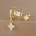 Macro detail of gold floral earrings set with white zircons and S925 hallmark - Gold (Y26002-10)