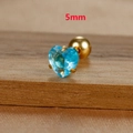 Macro view of 5mm heart-shaped blue zircon stud earring with gold screw ball backing - 5mm / Gold