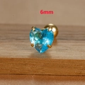 Macro shot of 6mm heart-shaped light blue stud earring with golden screw back base - 6mm / Gold