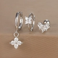 Detailed close-up of three-piece silver floral and heart zircon earring set for women - Silver (Y26002-14)