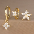 Macro shot of gold-plated S925 sterling silver earring set with zircons and flower charms - Five-petal Flower Heart Style (Y26003-20) / Gold